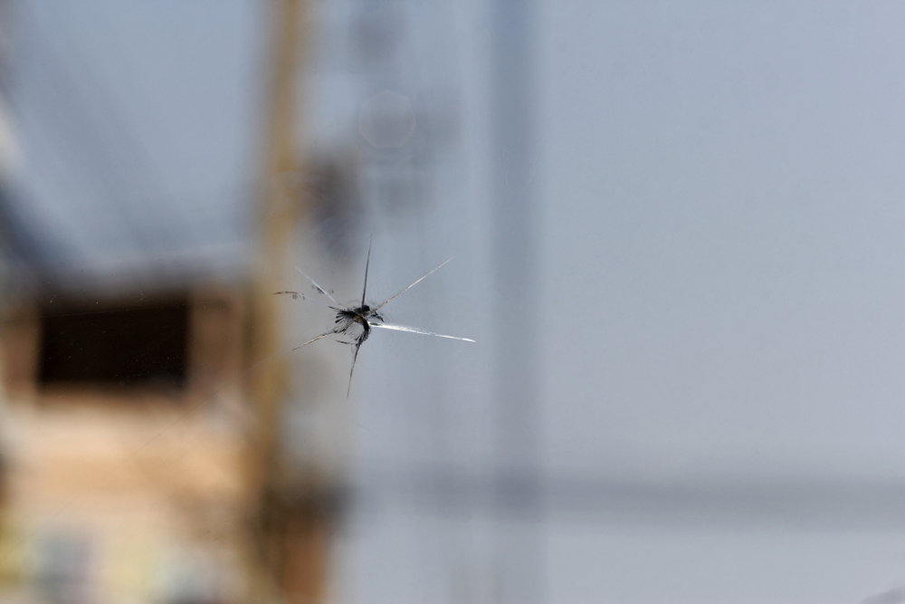 Small,Crack,And,Dust,On,Car,Windscreen,,,Stone,Hit